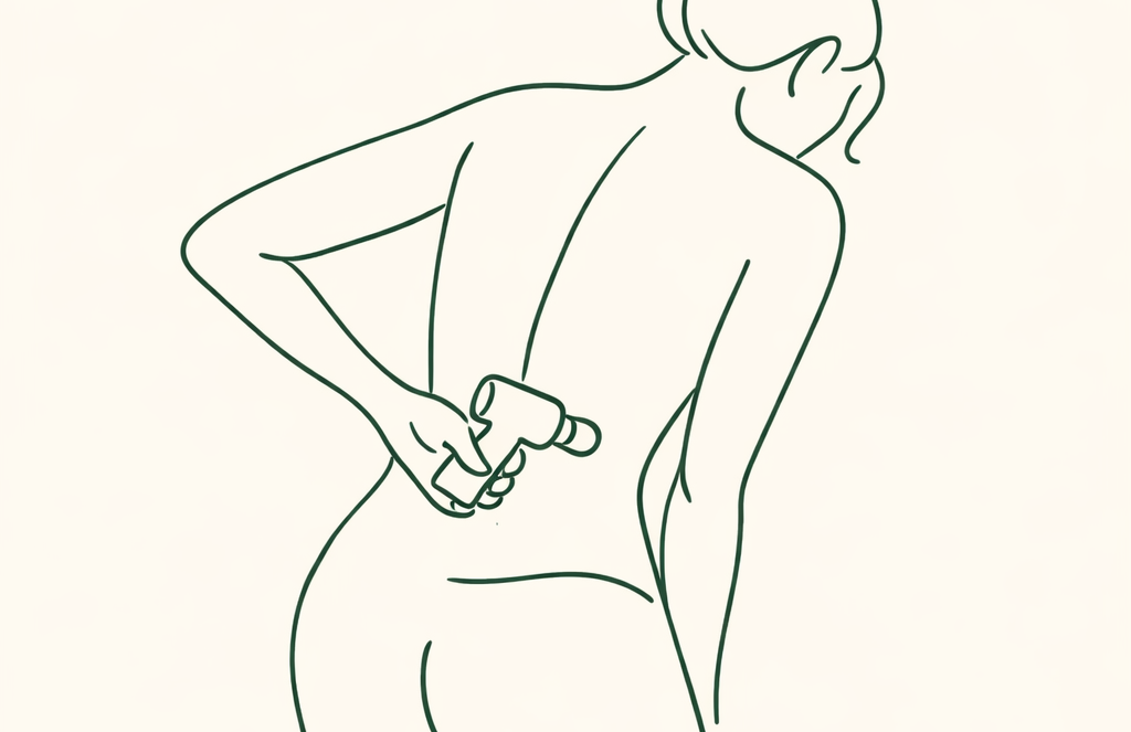 Pistolet de massage sur la région lombaire